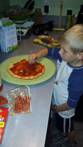 Brady making his pizza